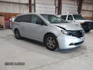 2012 Honda Odyssey EX z VIN 5FNRL5H47CB045705, wystawiony jako IAAI lot #42384430 z przebiegiem 157 598 mil mil oraz . Historia ofert i sprzedaży dostępna na DreamBid. Obrazek 1.