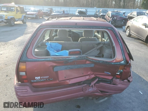 1996 Ford Escort z VIN 1FASP15J7TW112703, wystawiony jako Copart lot #84905564 z przebiegiem 119 575 mil mil oraz Szkoda całkowita • Salvage title. Historia ofert i sprzedaży dostępna na DreamBid. Obrazek 6.