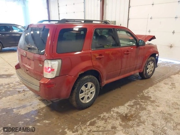 2010 Mercury Mariner with VIN 4M2CN9BG1AKJ11847, listed as a IAAI auction lot 41642322 with 144,584 mi miles. Bid and sale history available at carsss.com. Image 4.