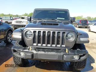 2022 Jeep Wrangler Unlimited Rubicon 392 с VIN 1C4JJXSJ6NW193565, выставлен на аукционе IAAI как лот 42050331 с пробегом 21 382 миль миль и . История ставок и продаж доступна на DreamBid. Изображение 12.