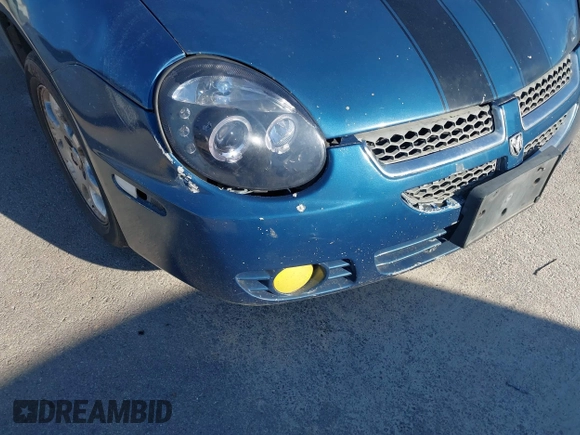2003 Dodge Neon SXT with VIN 1B3ES56C43D150870, listed as a IAAI auction lot 41478965 with 219,292 mi miles. Bid and sale history available at carsss.com. Image 13.