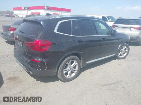 2019 BMW X3 sDrive30i z VIN 5UXTR7C52KLF24627, wystawiony jako IAAI lot #41821295 z przebiegiem 98 308 mil mil oraz . Historia ofert i sprzedaży dostępna na DreamBid. Obrazek 4.