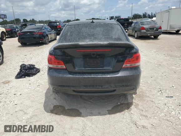 2012 BMW 1 Series 135i with VIN WBAUC9C5XCVM12807, listed as a Copart auction lot 61680225 with 117,314 mi miles and Salvage title. Bid and sale history available at DreamBid. Image 6.