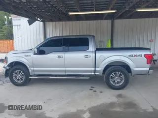 2020 Ford F-150 XL with VIN 1FTEW1E56LFA27123, listed as a IAAI auction lot 42212376 with 82,390 mi miles and . Bid and sale history available at DreamBid. Image 14.