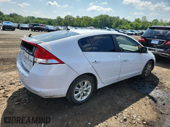 2010 Honda Insight EX с VIN JHMZE2H75AS024918, выставлен на аукционе Copart как лот 66526265 с пробегом 312 605 миль миль и Списание • Salvage title. История ставок и продаж доступна на DreamBid. Изображение 3.