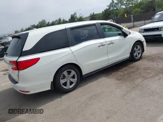 2019 Honda Odyssey EX with VIN 5FNRL6H59KB075219, listed as a IAAI auction lot 42435591 with 51,663 mi miles and . Bid and sale history available at DreamBid. Image 4.
