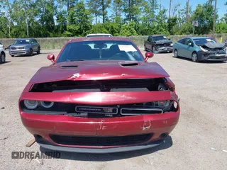 2017 Dodge Challenger SXT z VIN 2C3CDZAG8HH568476, wystawiony jako IAAI lot #42334027 z przebiegiem 161 515 mil mil oraz . Historia ofert i sprzedaży dostępna na DreamBid. Obrazek 6.
