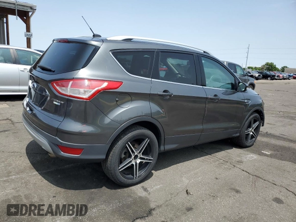2015 Ford Escape Titanium with VIN 1FMCU9J98FUB49112, listed as a Copart auction lot 58989915 with 94,060 mi miles and Salvage title. Bid and sale history available at DreamBid. Image 3.