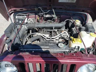 2002 Jeep Wrangler Sport with VIN 1J4FA49SX2P713303, listed as a IAAI auction lot 42136848 with 152,822 mi miles. Bid and sale history available at carsss.com. Image 10.