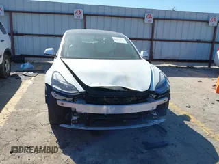 2022 Tesla Model 3 with VIN 5YJ3E1EA7NF103513, listed as a IAAI auction lot 41643592 with 35,631 mi miles and . Bid and sale history available at DreamBid. Image 12.