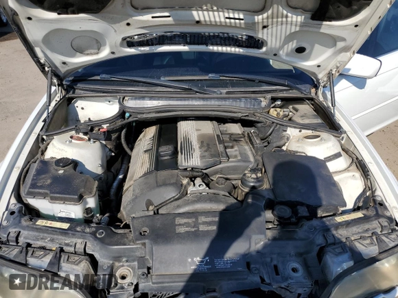 2003 BMW 3 Series 330Ci with VIN WBABN53433PH03075, listed as a Copart auction lot 77252924 with 191,265 mi miles and Salvage title. Bid and sale history available at DreamBid. Image 11.