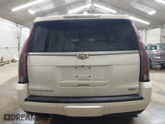 2015 Cadillac Escalade Luxury z VIN 1GYS4MKJ0FR566796, wystawiony jako IAAI lot #42044792 z przebiegiem 176 162 mil mil oraz . Historia ofert i sprzedaży dostępna na DreamBid. Obrazek 16.