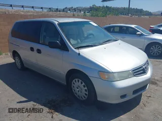 2004 Honda Odyssey LX z VIN 5FNRL18524B142541, wystawiony jako IAAI lot #42157633 z przebiegiem 178 361 mil mil oraz . Historia ofert i sprzedaży dostępna na DreamBid. Obrazek 1.