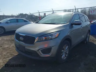 2016 Kia Sorento LX with VIN 5XYPGDA54GG065563, listed as a IAAI auction lot 41801533 with 126,557 mi miles. Bid and sale history available at carsss.com. Image 2.