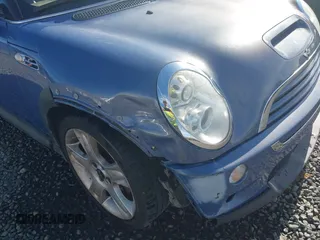2005 MINI Convertible S with VIN WMWRH33455TF82408, listed as a IAAI auction lot 41857791 with 133,824 mi miles and . Bid and sale history available at DreamBid. Image 6.