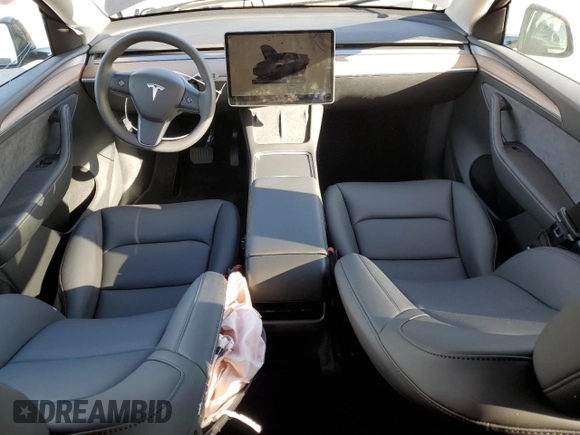 2025 Tesla Model Y Long Range with VIN 7SAYGDEE4SF272942, listed as a Copart auction lot 45817885 with 2,308 mi miles and Salvage Title. Bid and sale history available at DreamBid. Image 8.