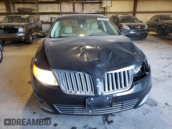 2012 Lincoln MKS with VIN 1LNHL9DR1CG806704, listed as a Copart auction lot 87666765 with 111,933 mi miles and Salvage Title. Bid and sale history available at carsss.com. Image 5.