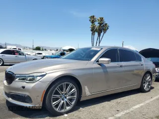 2018 BMW 7 Series 750i with VIN WBA7F0C55JGM23618, listed as a Copart auction lot 64237555 with 54,211 mi miles and Salvage title. Bid and sale history available at DreamBid. Image 1.