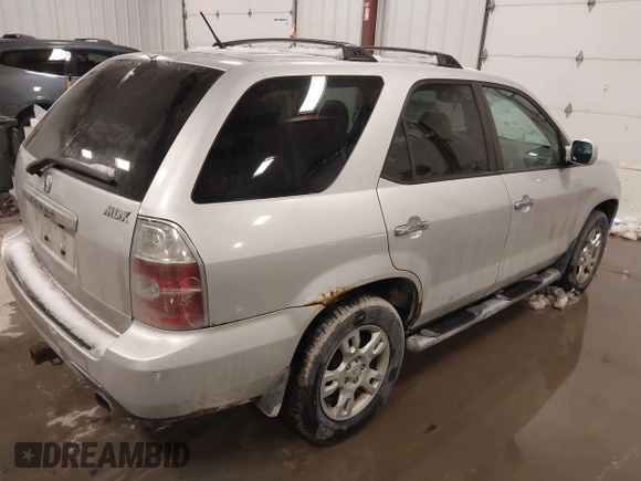2004 Acura MDX Touring Pkg w/Navigation with VIN 2HNYD18874H506394, listed as a IAAI auction lot 41589065 with 211,253 mi miles. Bid and sale history available at carsss.com. Image 4.
