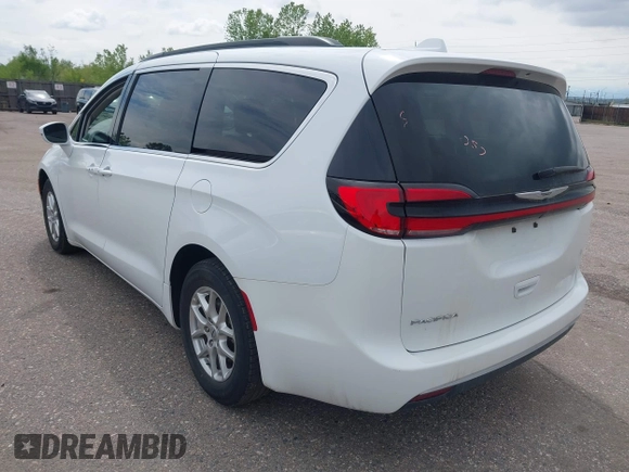 2022 Chrysler Pacifica Touring L with VIN 2C4RC1BG5NR170186, listed as a IAAI auction lot 41422057 with 71,204 mi miles and . Bid and sale history available at DreamBid. Image 3.