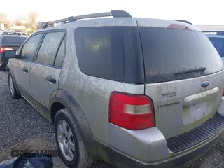 2005 Ford Freestyle SE with VIN 1FMZK01165GA52333, listed as a IAAI auction lot 41062704 with 234,459 mi miles. Bid and sale history available at carsss.com. Image 3.