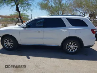 2016 Dodge Durango SXT with VIN 1C4RDHAG3GC361849, listed as a IAAI auction lot 42228712 with 128,084 mi miles and . Bid and sale history available at DreamBid. Image 15.