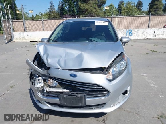 2014 Ford Fiesta SE with VIN 3FADP4EJ8EM121567, listed as a IAAI auction lot 42229439 with 108,640 mi miles and . Bid and sale history available at DreamBid. Image 6.