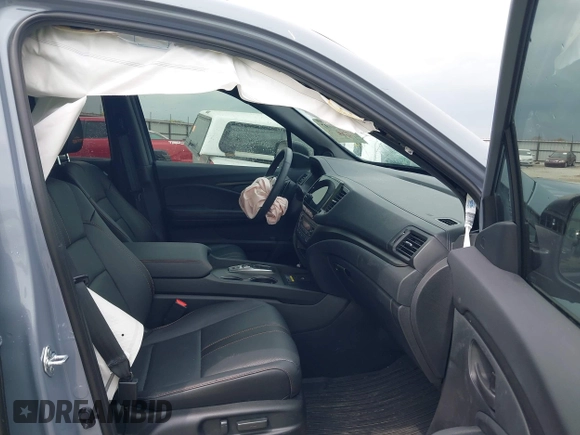 2025 Honda Passport TrailSport z VIN 5FNYF8H69SB012063, wystawiony jako IAAI lot #42060797 z przebiegiem 6078 mil mil oraz . Historia ofert i sprzedaży dostępna na DreamBid. Obrazek 5.