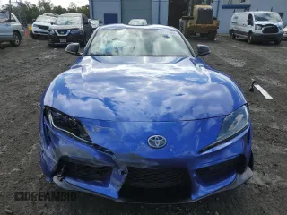 2023 Toyota Supra 3.0 z VIN WZ1DB0G02PW059707, wystawiony jako Copart lot #69791693 z przebiegiem 7559 mil mil oraz . Historia ofert i sprzedaży dostępna na DreamBid. Obrazek 5.