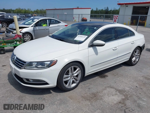 2014 Volkswagen CC Executive z VIN WVWRP7AN7EE537318, wystawiony jako IAAI lot #42308532 z przebiegiem 217 059 mil mil oraz . Historia ofert i sprzedaży dostępna na DreamBid. Obrazek 2.