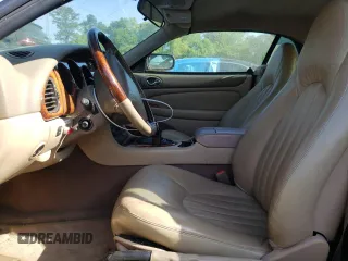 1999 Jaguar XK with VIN SAJGX2043XC040866, listed as a Copart auction lot 53712555 with 65,349 mi miles and Clean Title. Bid and sale history available at DreamBid. Image 7.