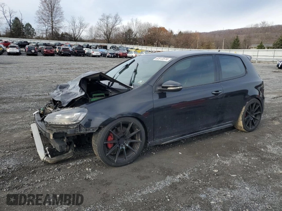 2012 Volkswagen GTI w/Conv & Sunroof with VIN WVWEV7AJ5CW263299, listed as a Copart auction lot 82613574 with 121,505 mi miles and Salvage title. Bid and sale history available at DreamBid. Image 1.