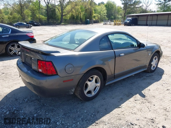 2004 Ford Mustang Standard z VIN 1FAFP40644F236905, wystawiony jako IAAI lot #42016081 z przebiegiem 167 733 mil mil oraz . Historia ofert i sprzedaży dostępna na DreamBid. Obrazek 4.