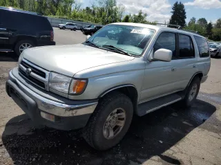 2000 Toyota 4Runner SR5 z VIN JT3HN86R9Y0290523, wystawiony jako Copart lot #57134535 z przebiegiem 324 334 mil mil oraz Szkoda całkowita • Salvage title. Historia ofert i sprzedaży dostępna na DreamBid. Obrazek 1.