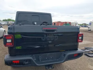 2021 Jeep Gladiator Freedom z VIN 1C6HJTAG4ML586999, wystawiony jako IAAI lot #41911751 z przebiegiem 81 030 mil mil oraz . Historia ofert i sprzedaży dostępna na DreamBid. Obrazek 16.