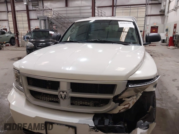 2009 Dodge Dakota Bighorn/Lonestar with VIN 1D3HW32P79S819674, listed as a IAAI auction lot 41962369 with 157,399 mi miles and . Bid and sale history available at carsss.com. Image 13.