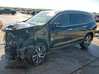 2017 Honda Pilot Elite with VIN 5FNYF6H04HB023609, listed as a Copart auction lot 52235425 with 107,997 mi miles and Salvage Title. Bid and sale history available at DreamBid. Image 1.