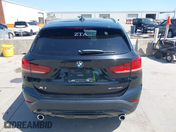 2021 BMW X1 sDrive28i with VIN WBXJG7C07M3M65841, listed as a IAAI auction lot 41877032 with 79,817 mi miles and . Bid and sale history available at DreamBid. Image 16.