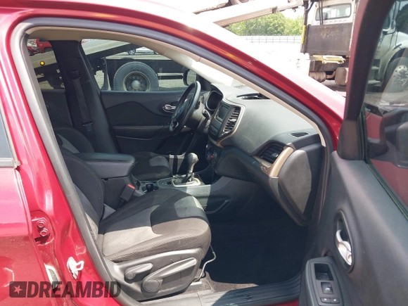 2016 Jeep Cherokee Sport with VIN 1C4PJLAB9GW302925, listed as a IAAI auction lot 42206944 with 133,950 mi miles and . Bid and sale history available at DreamBid. Image 5.