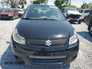 2009 Suzuki SX4 Sport FWD z VIN JS2YC414796203079, wystawiony jako Copart lot #57280845 z przebiegiem 170 213 mil mil oraz Szkody całkowita. Historia ofert i sprzedaży dostępna na DreamBid. Obrazek 5.