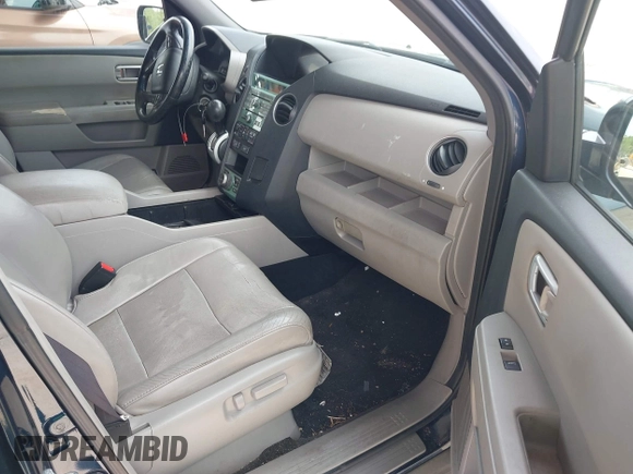 2011 Honda Pilot Touring z VIN 5FNYF3H94BB032105, wystawiony jako IAAI lot #42435522 z przebiegiem 247 899 mil mil oraz . Historia ofert i sprzedaży dostępna na DreamBid. Obrazek 5.
