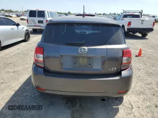 2013 Scion xD z VIN JTKKUPB44D1028981, wystawiony jako Copart lot #55114845 z przebiegiem 170 581 mil mil oraz Szkoda całkowita • Salvage title. Historia ofert i sprzedaży dostępna na DreamBid. Obrazek 6.