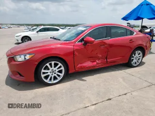 2014 Mazda 6 i Touring with VIN JM1GJ1V69E1151693, listed as a Copart auction lot 63113645 with 215,354 mi miles and Salvage title. Bid and sale history available at DreamBid. Image 1.