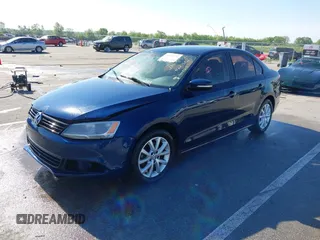 2011 Volkswagen Jetta SE with VIN 3VWDZ7AJ5BM319334, listed as a IAAI auction lot 42275321 with 111,989 mi miles and . Bid and sale history available at DreamBid. Image 2.