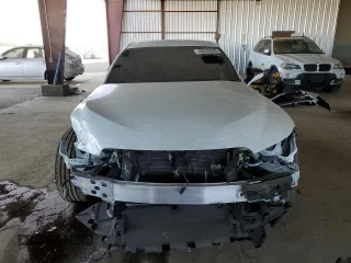 2023 Lexus IS with VIN JTHGZ1B22P5065405, listed as a Copart auction lot 46936285 with 31,971 mi miles and Salvage Title. Bid and sale history available at carsss.com. Image 5.