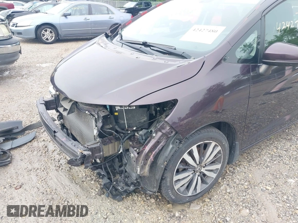 2015 Honda Fit EX z VIN 3HGGK5G80FM751625, wystawiony jako IAAI lot #42427480 z przebiegiem 109 657 mil mil oraz . Historia ofert i sprzedaży dostępna na DreamBid. Obrazek 18.