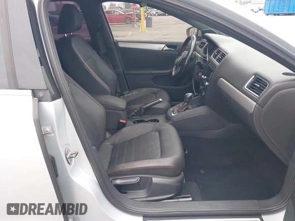 2012 Volkswagen Jetta GLI Autobahn with VIN 3VW4A7AJ1CM450205, listed as a IAAI auction lot 42421504 with 130,602 mi miles and . Bid and sale history available at DreamBid. Image 5.