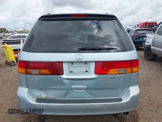 2004 Honda Odyssey EX-L with VIN 5FNRL18064B060817, listed as a IAAI auction lot 42032796 with 200,999 mi miles and . Bid and sale history available at DreamBid. Image 17.