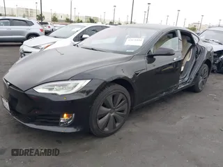 2020 Tesla Model S Long Range с VIN 5YJSA1E23LF390913, выставлен на аукционе IAAI как лот 42031044 с пробегом 93 403 миль миль и . История ставок и продаж доступна на DreamBid. Изображение 2.