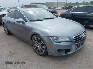 2013 Audi A7 3.0 Premium Plus with VIN WAUYGAFC1DN069906, listed as a IAAI auction lot 41906962 with 203,149 mi miles. Bid and sale history available at carsss.com. Image 1.